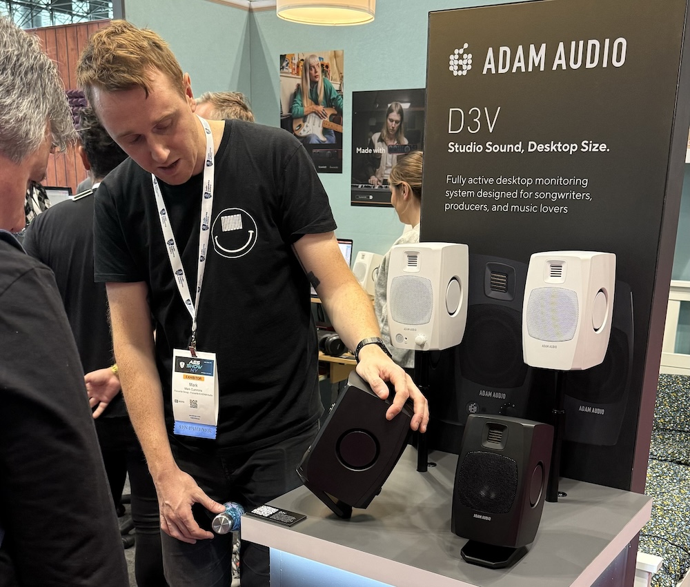 At the ADAM Audio booth, Mark Cummins, Head of Product Marketing, walks an attendee through the company’s new D3V studio monitors, intended for use in desktop and audiophile settings.