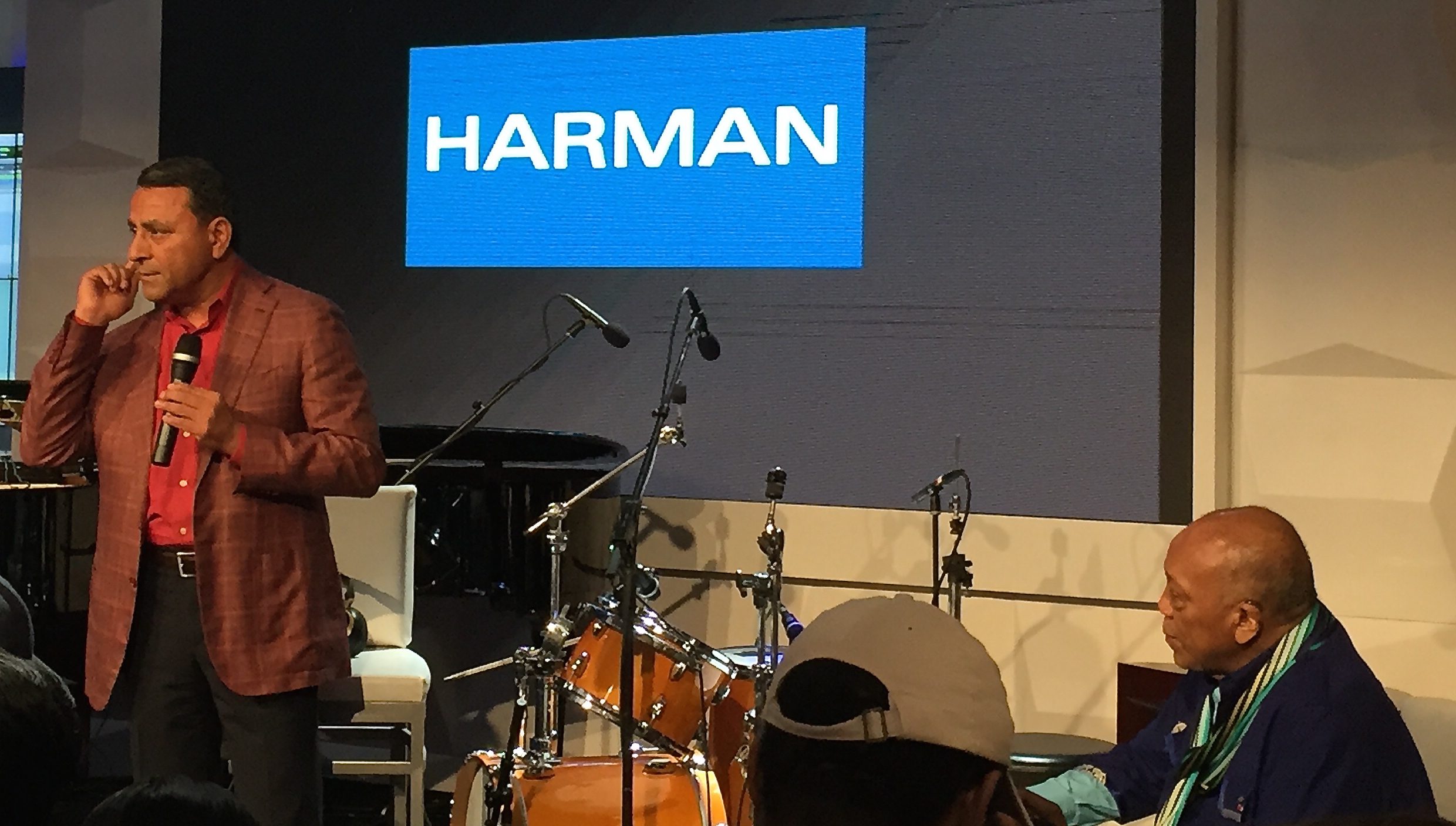 Dinesh Paliwal, CEO of Harman (left) and Quincy Jones (right) introduce AKG's new N90Q headphones at the Harman flagship store in New York City, June 26, 2015.
