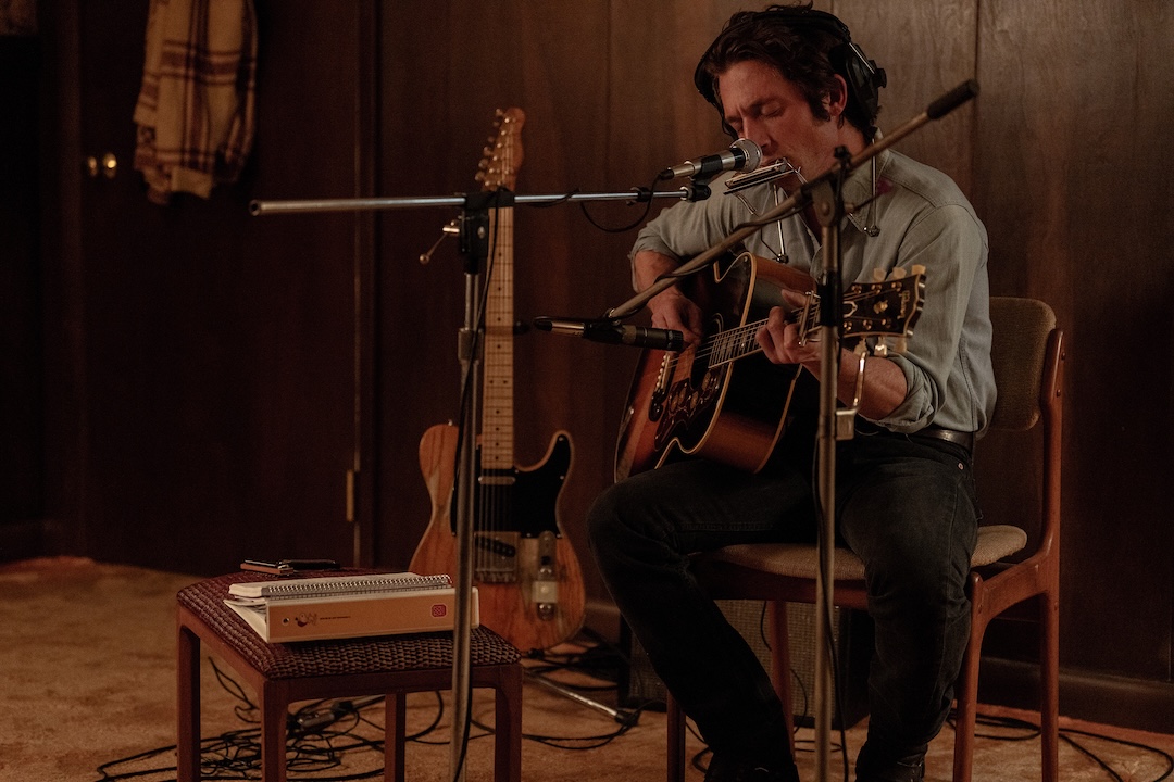 Actor Jeremy Allen White as Bruce Springsteen in ‘Springsteen:  Delivery Me From Nowhere,’ recording Nebraska tracks at his rented house in Colts Neck, New Jersey in 1981. Photo: Macall Polay/20th Century Studios. 