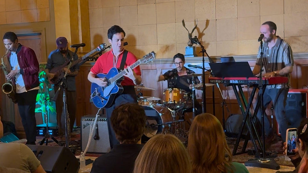 Funk artist Dylan Chambers and his band entertained the assembled crowd with a raucous set, demonstrating the SLX-D+ wireless system in use.