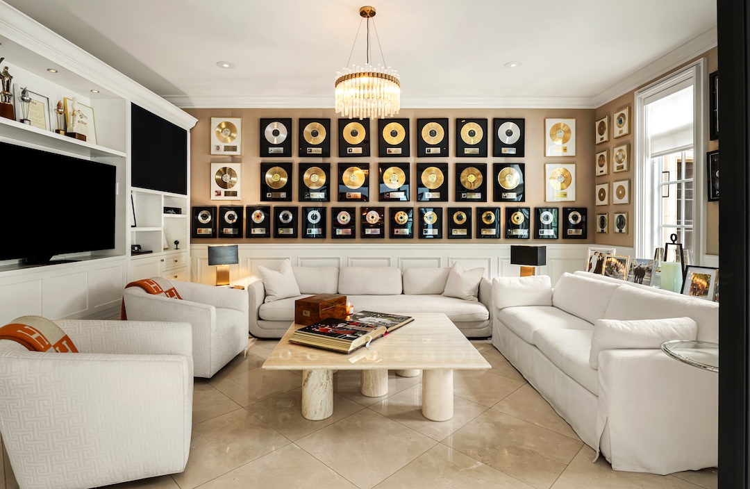 The room living spaces are the perfect place to highlight a career's worth of gold record awards. Photo: Courtesy of Compass/Ginger Glass.