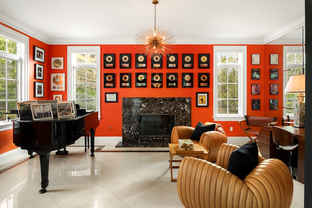 The room living spaces are the perfect place to highlight a career's worth of gold record awards. Photo: Courtesy of Compass/Ginger Glass.