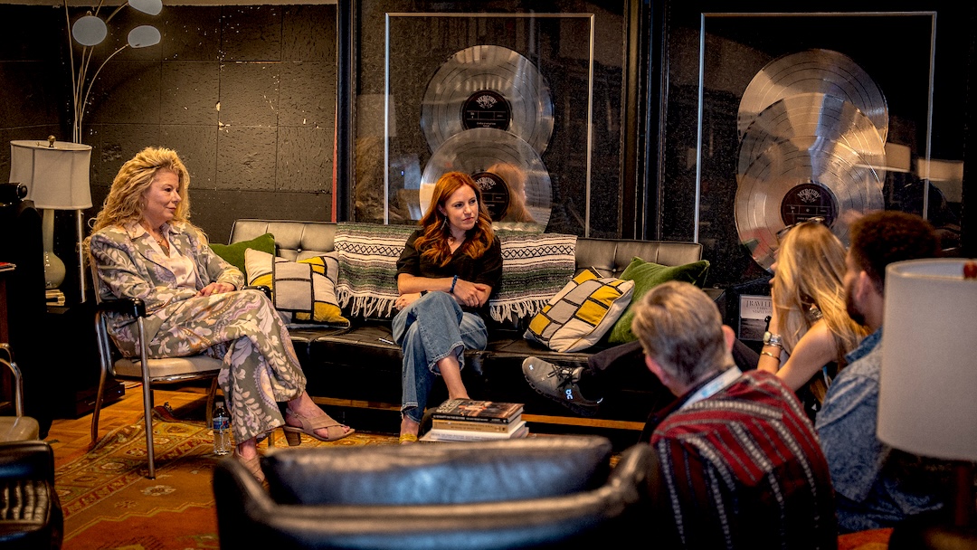 The grande dame of Nashville music and recording Sharon Corbitt, at left, and RCA Studio A studio manager Sheridan Gates, chat with attendees in the back-of-the-studio lounge. Photo: Future/Kevin Craig