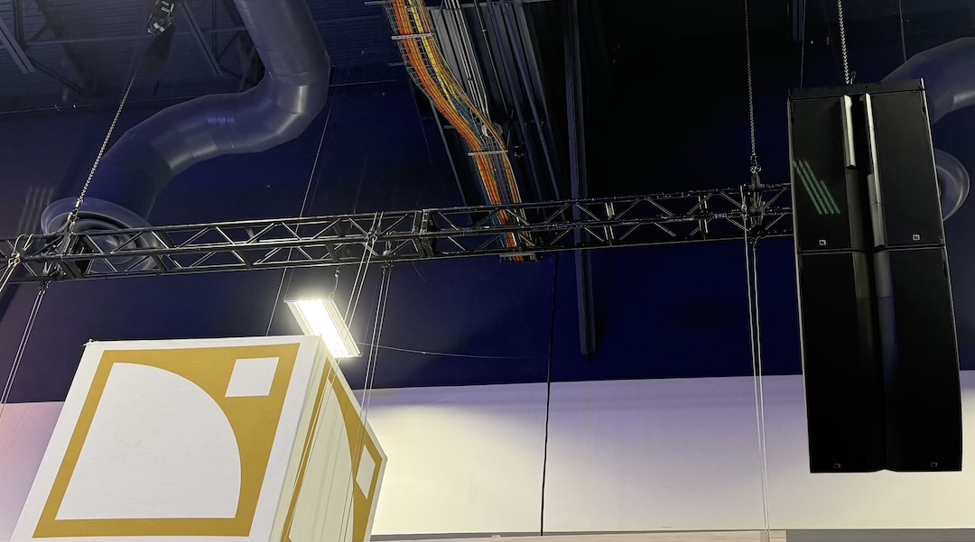 L-Acoustics had its L1 System— L1 and L1D, acoustically identical enclosures that differ in their progressive curvature—hanging high above its booth. Photo: Future.