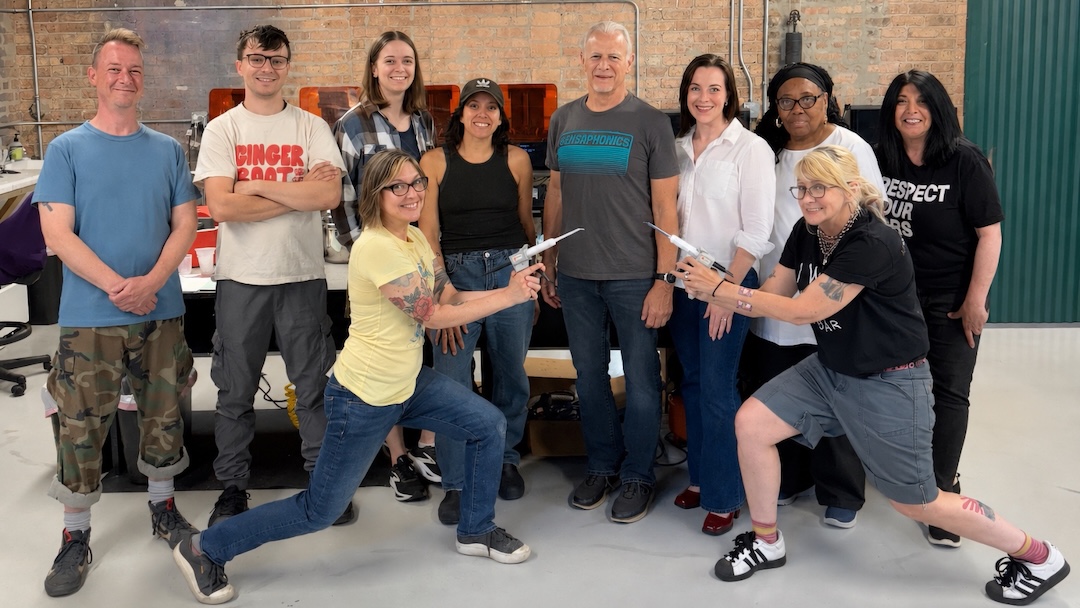 Members of the Sensaphonics team at the company’s new headquarters and hearing clinic.