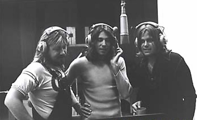Terry Kath, Robert Lamm and Peter Cetera track a background vocal.